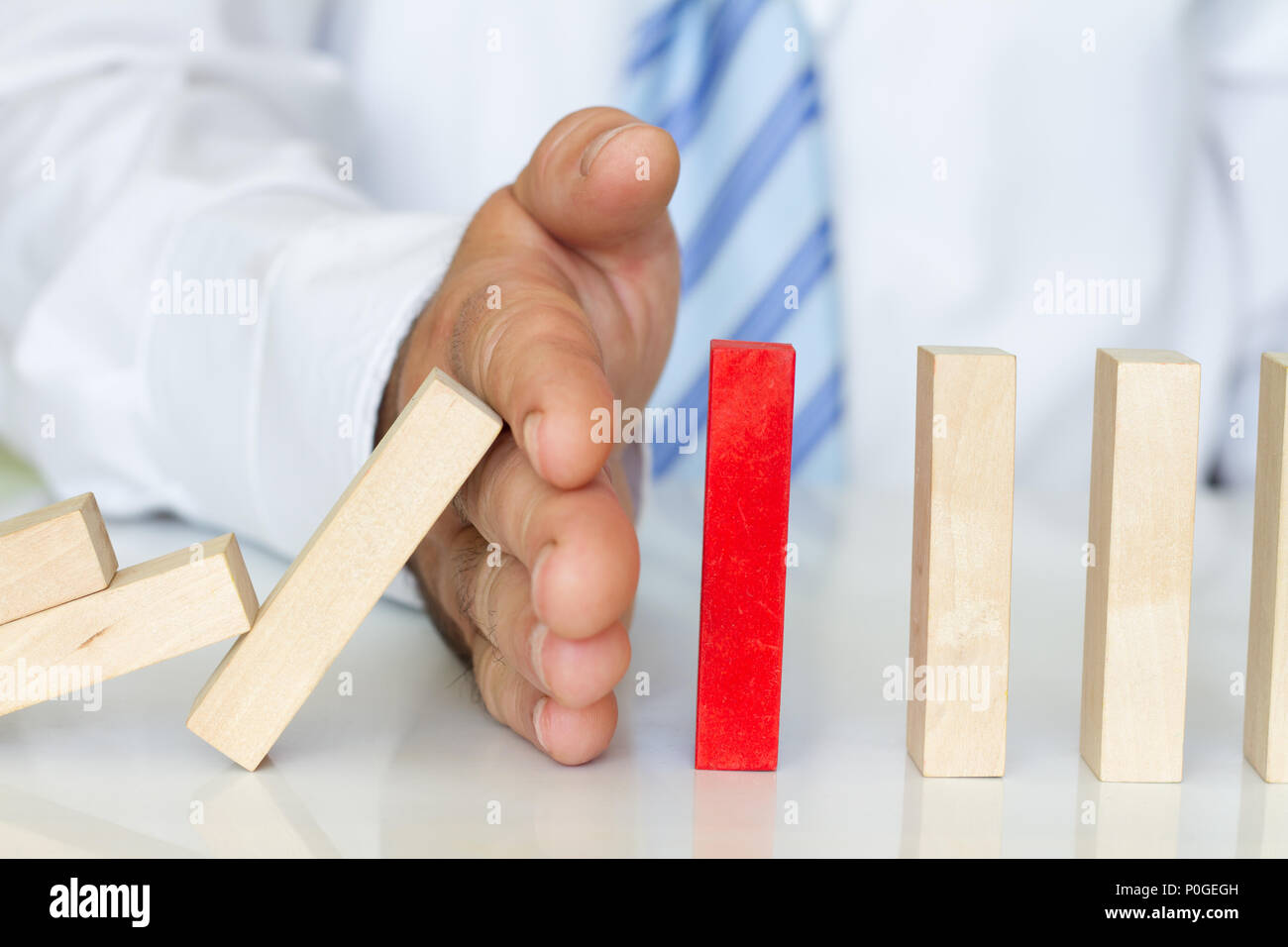 Solving problem and domino effect abstract business concept Stock Photo