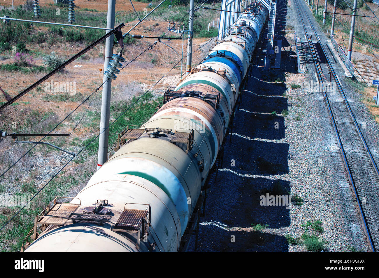 Train with oil tanks moving. Transportation of fuel on the railroad