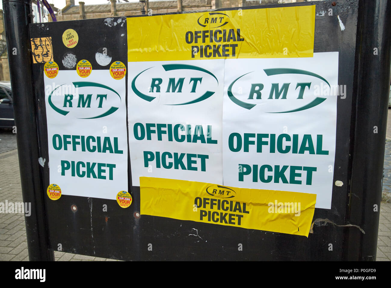 RMT union official picket signs outside Carlisle train station Cumbria England UK Stock Photo