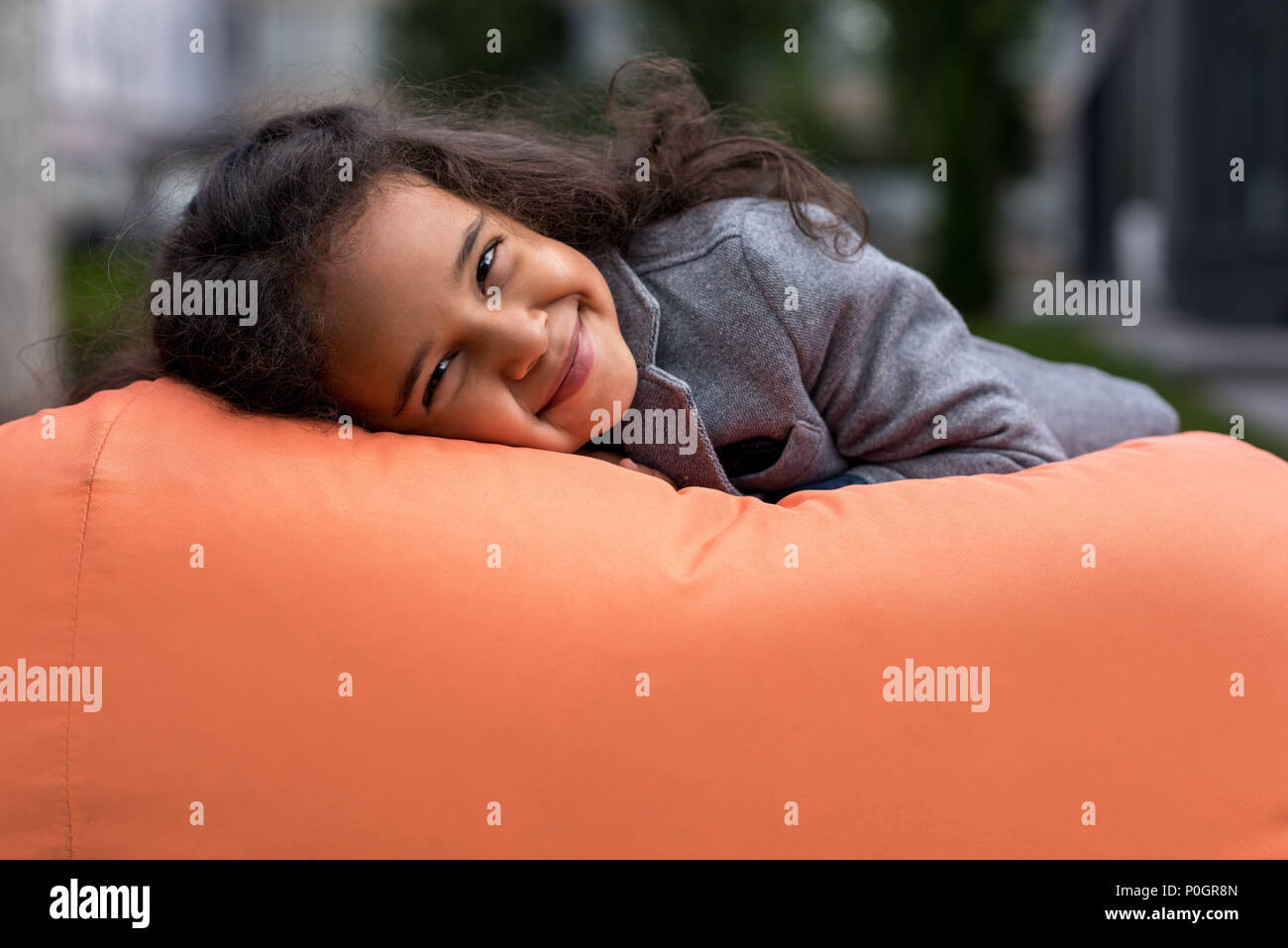 Preteen girl lying on back hi-res stock photography and images - Alamy