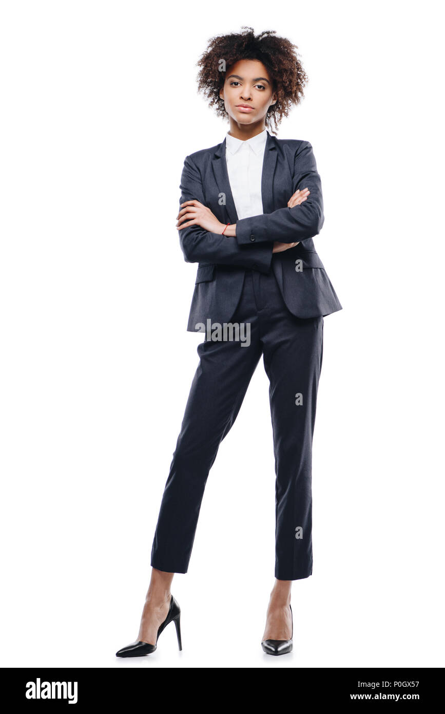 attractive african american businesswoman in suit with crossed arms ...