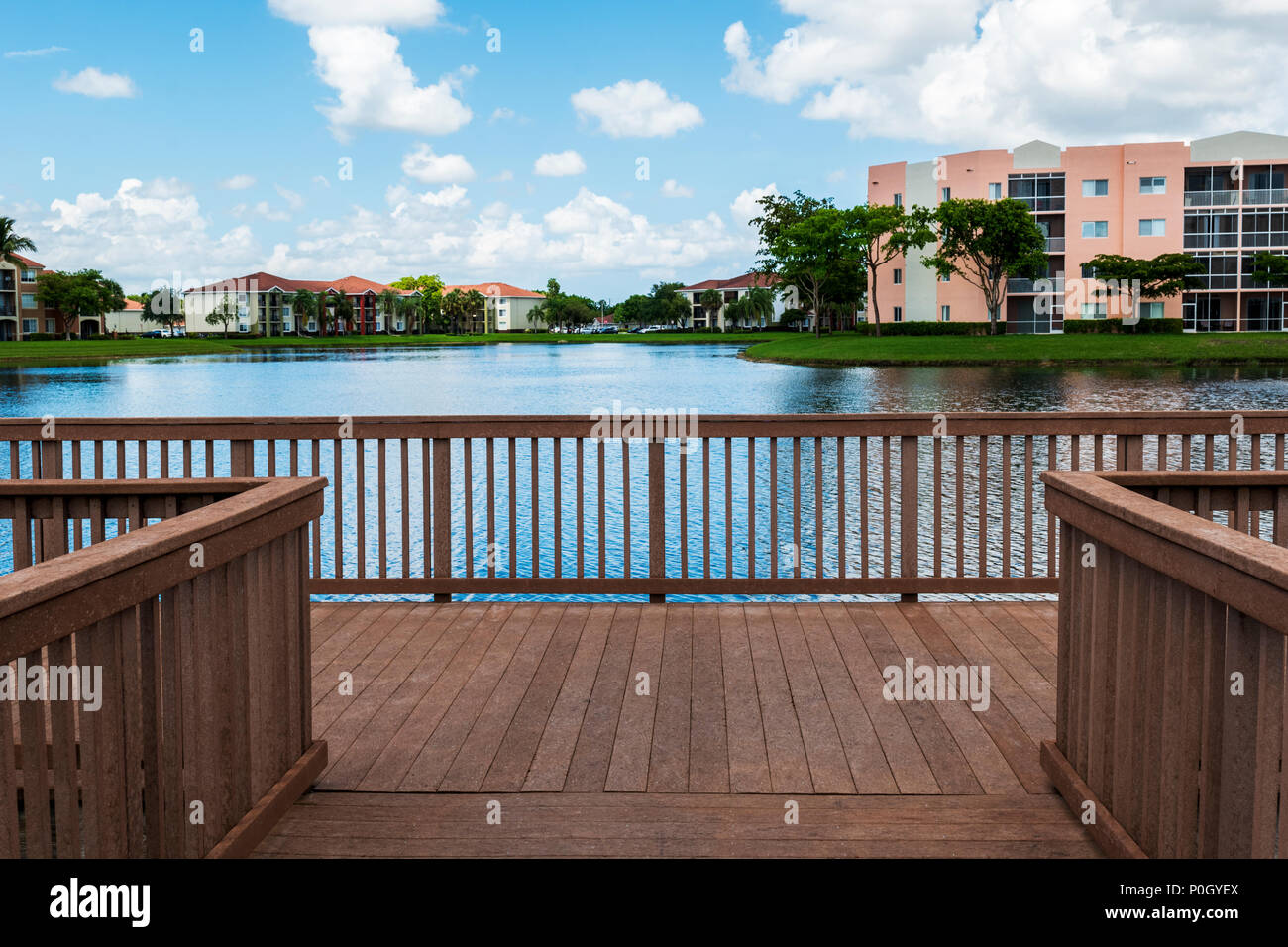 Dock - pier on lake; residential community; south central Florida; USA Stock Photo