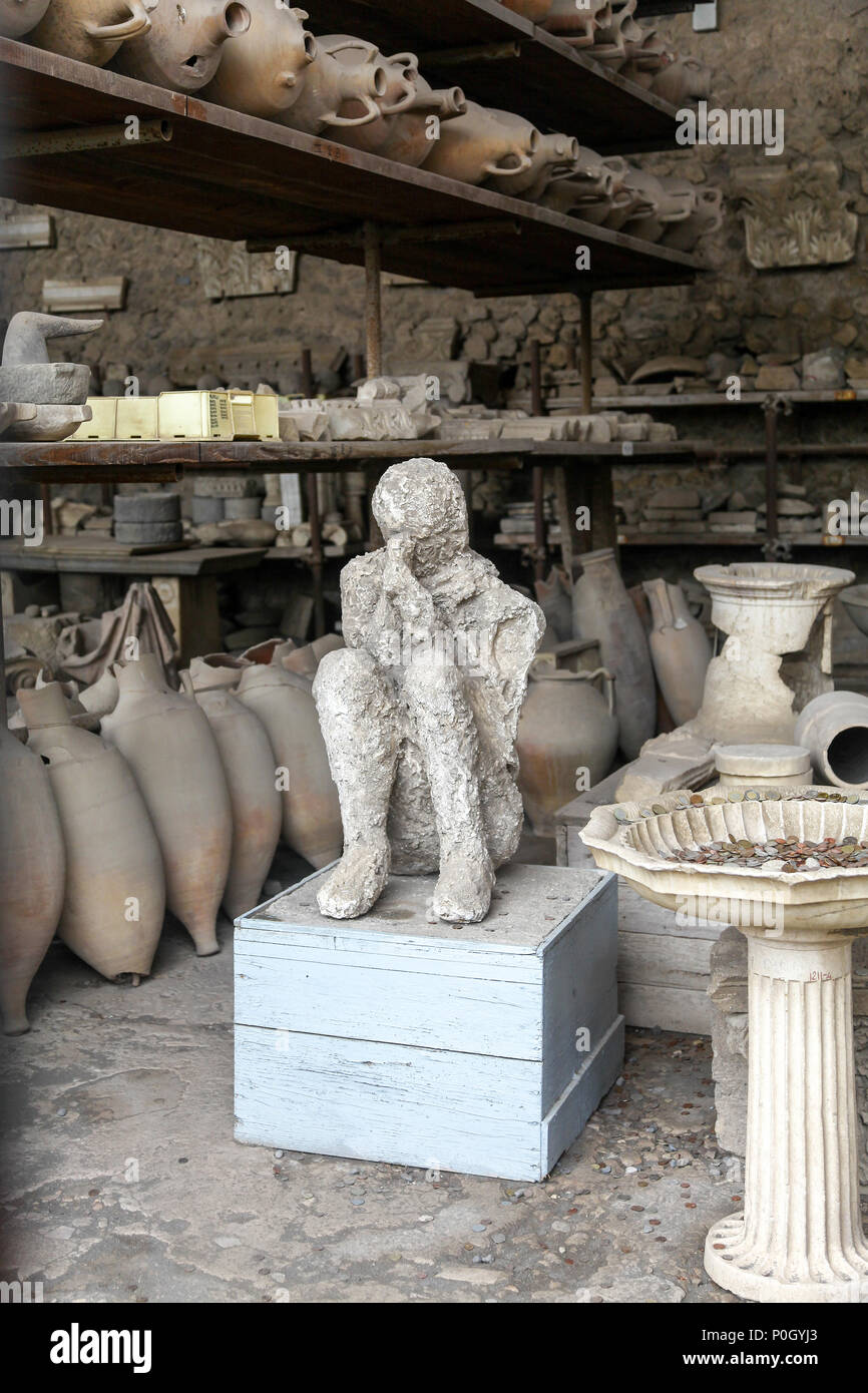 Bodies preserved as plaster casts from the eruption of Vesuvius in AD 79 at the Pompeii Archaeological site, Pompeii, Campania, Italy, Stock Photo