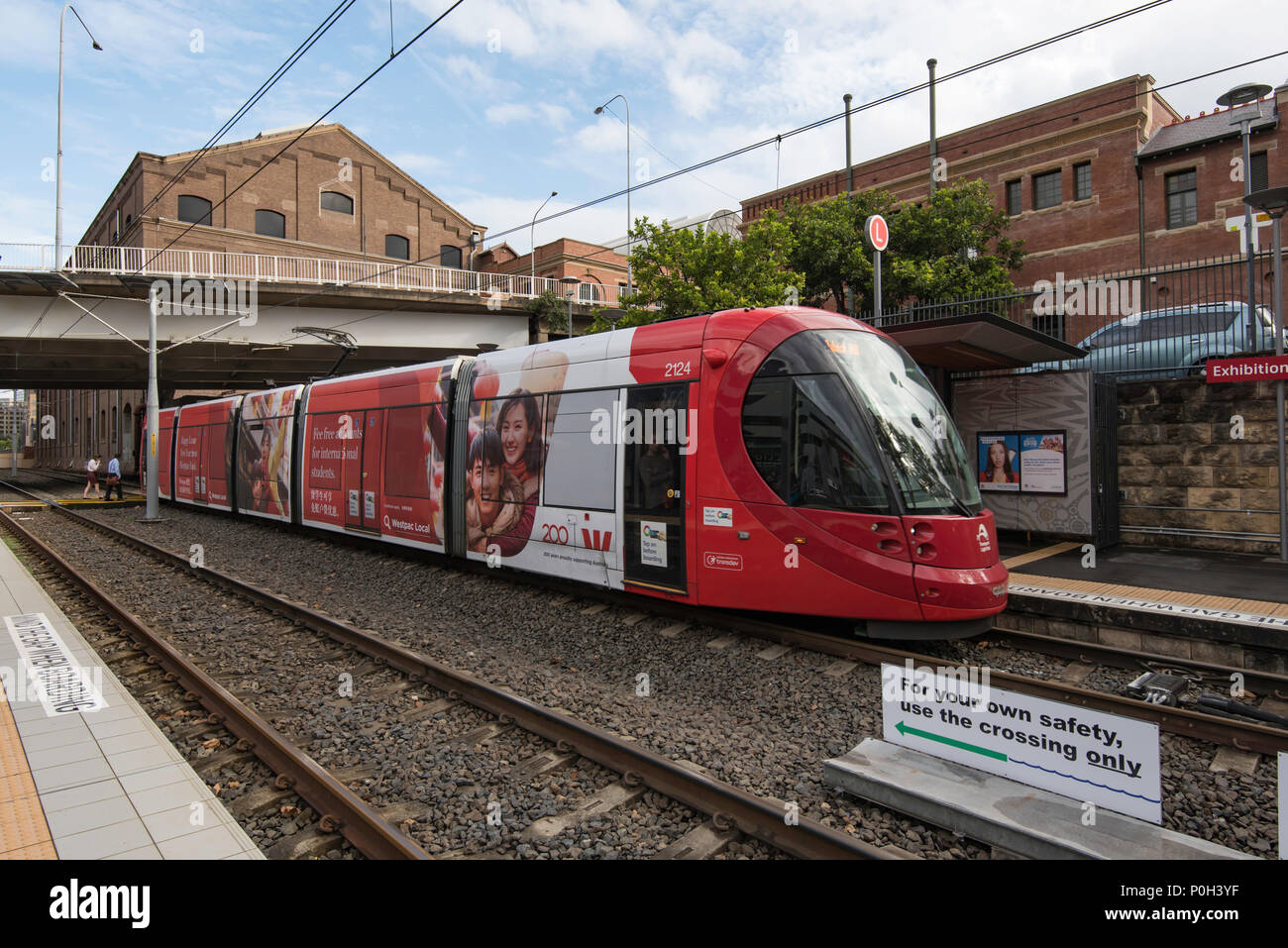 A Sydney Light Rail train or tram at the Exhibition Centre station in Sydney, Australia Stock Photo