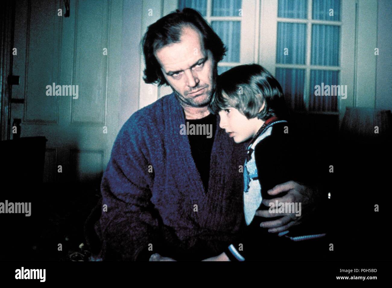 Original Film Title: THE SHINING.  English Title: THE SHINING.  Film Director: STANLEY KUBRICK.  Year: 1980.  Stars: JACK NICHOLSON; DANNY LLOYD. Credit: WARNER BROTHERS / Album Stock Photo