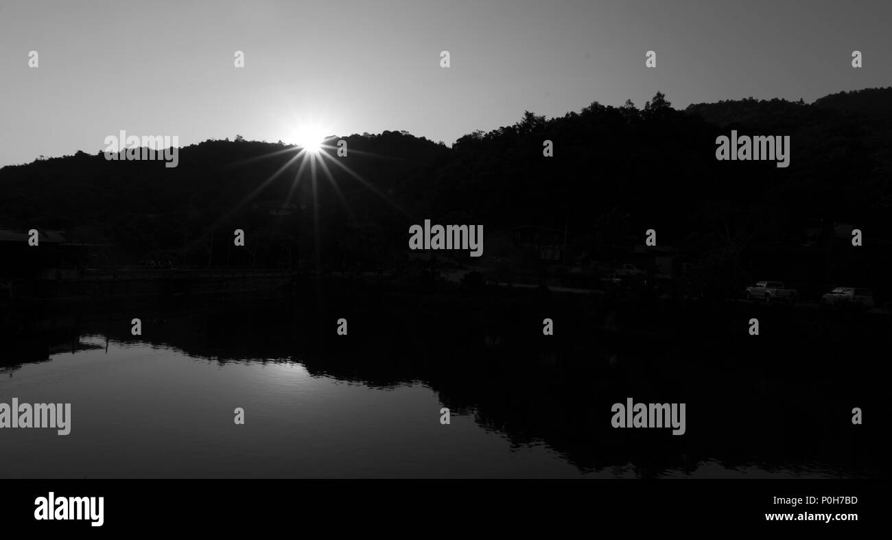 Evening sunlight over lake Black and White Stock Photos & Images - Alamy