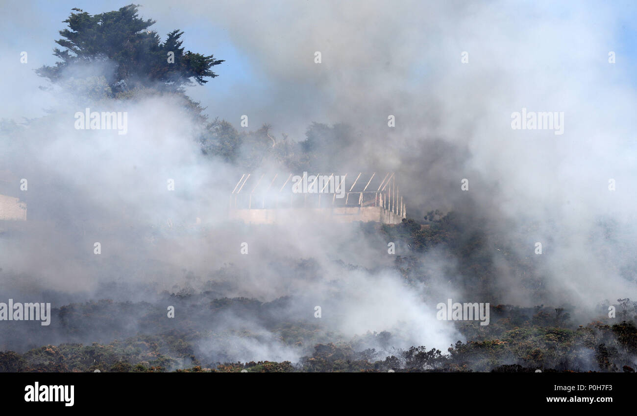Howth Fire Works Firefighters battle a gorse fire at Howth Head in Dublin as the hot ...