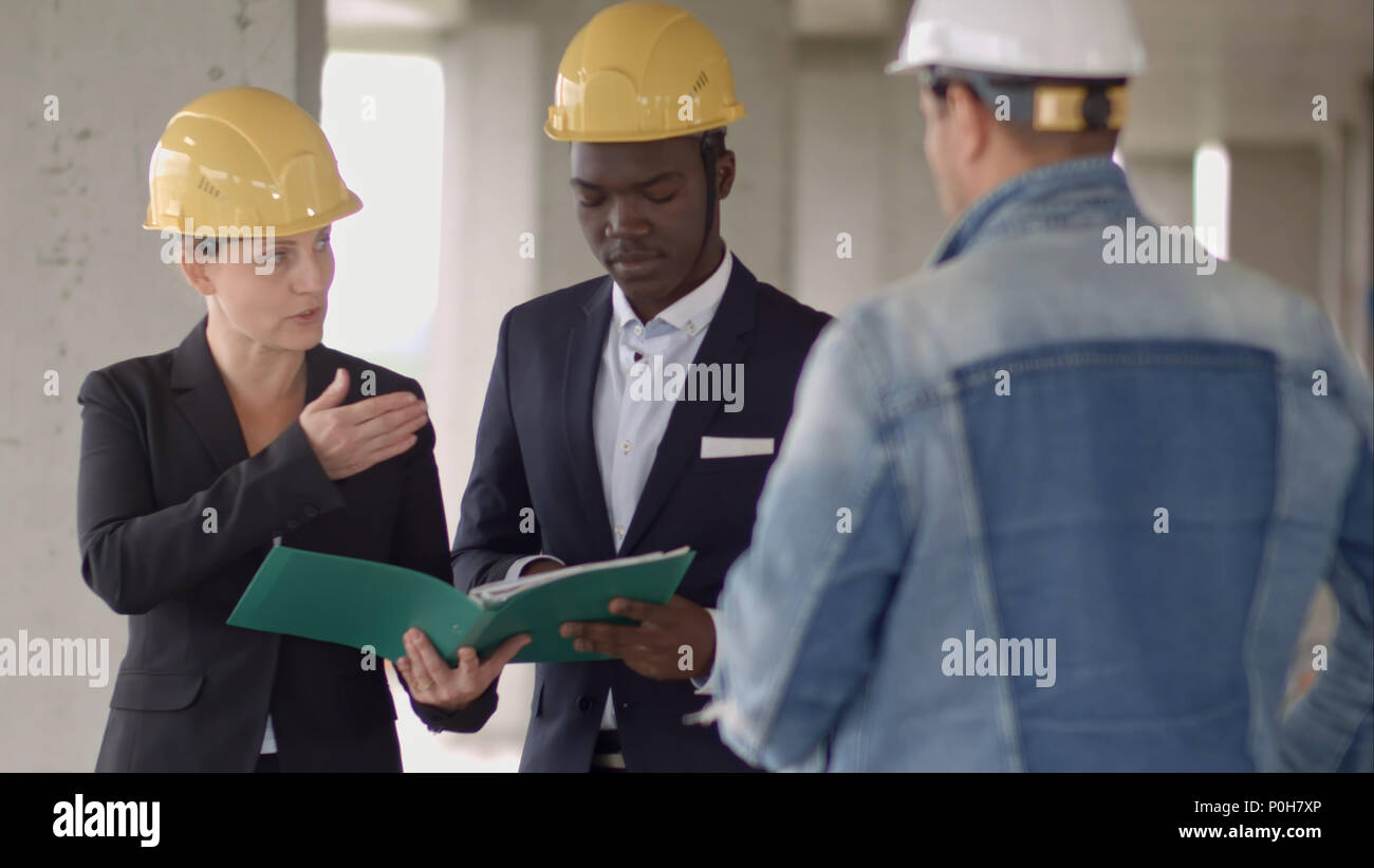 Businessman working with Architect Engineer in building Construction ...