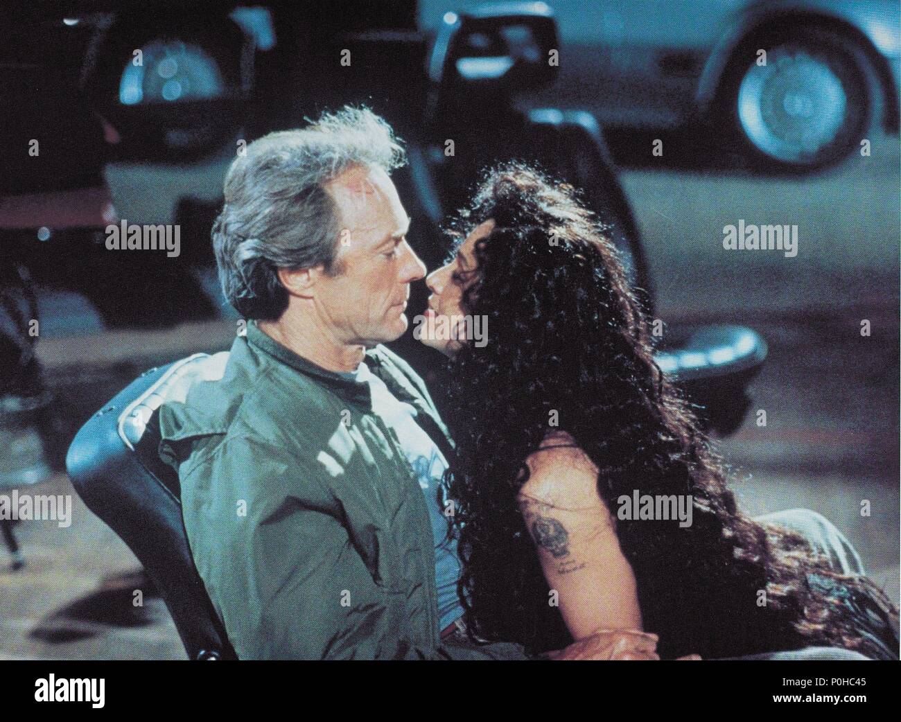 Original Film Title: THE ROOKIE. English Title: THE ROOKIE. Film Director:  CLINT EASTWOOD. Year: 1990. Stars: CLINT EASTWOOD; SONIA BRAGA. Credit:  WARNER BROTHERS / Album Stock Photo - Alamy