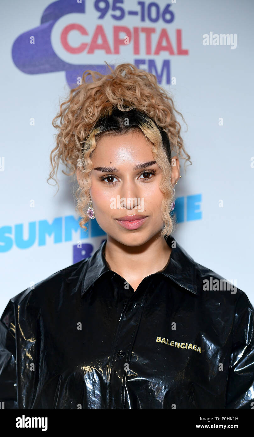 Raye on the red carpet of the media run at Capital's Summertime Ball with Vodafone at Wembley Stadium, London. PRESS ASSOCIATION Photo. This summer's hottest artists performed live for 80,000 Capital listeners at Wembley Stadium at the UK's biggest summer party. Performers included Camila Cabello, Shawn Mendes, Rita Ora, Charlie Puth, Jess Glyne, Craig David, Anne-Marie, Rudimental, Sean Paul, Clean Bandit, James Arthur, Sigala, Years & Years, Jax Jones, Raye, Jonas Blue, Mabel, Stefflon Don, Yungen and G-Eazy. Picture date: Saturday June 9, 2018. Photo credit should read: Ian West/PA Wire Stock Photo