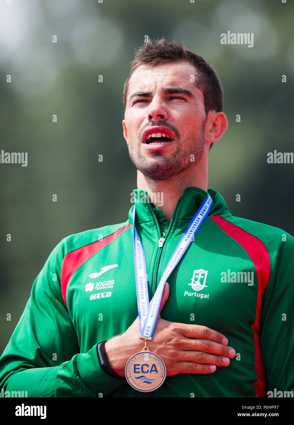 9th June 2018, Ada Ciganlija Regatta Course, Belgrade, Serbia; ECA Canoe Sprint and Paracanoe Senior European Championships; Fernando Pimenta of POR celebrates on the podium at the medal ceremony for the Men's Kayak Single (K1), 1000m sprint race Stock Photo