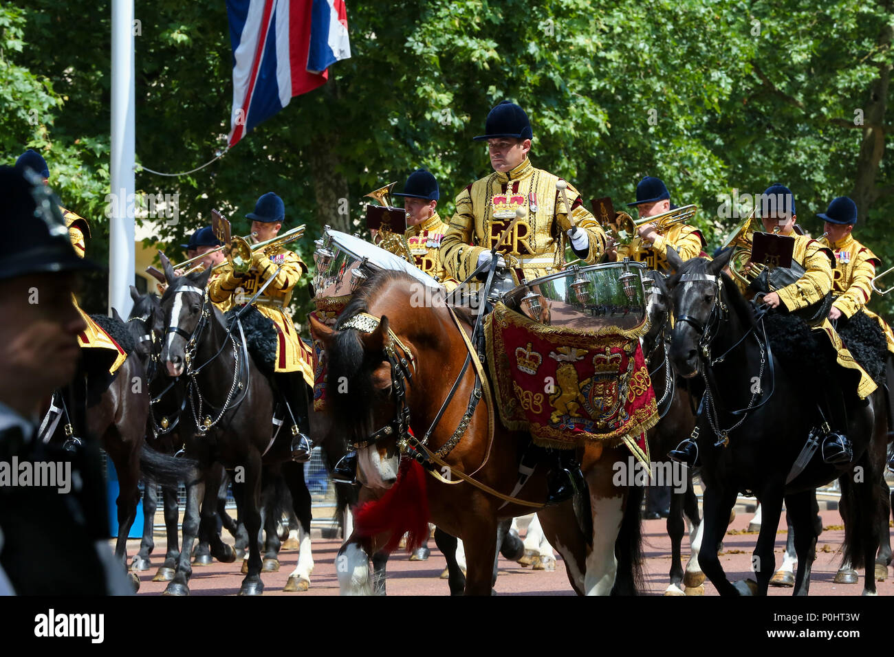 The Mall. London. UK 9 June 2018 - HM The Queen Elizabeth II joined by other members of the Royal Family travel along the Mall in an open top carriage during the Trooping the Colour which marks the 92nd celebration of The Queen's official birthday, during which she inspects troops from the Household Division as they march in Whitehall, before watching a fly-past from the balcony at Buckingham Palace. Credit: Dinendra Haria/Alamy Live News Stock Photo