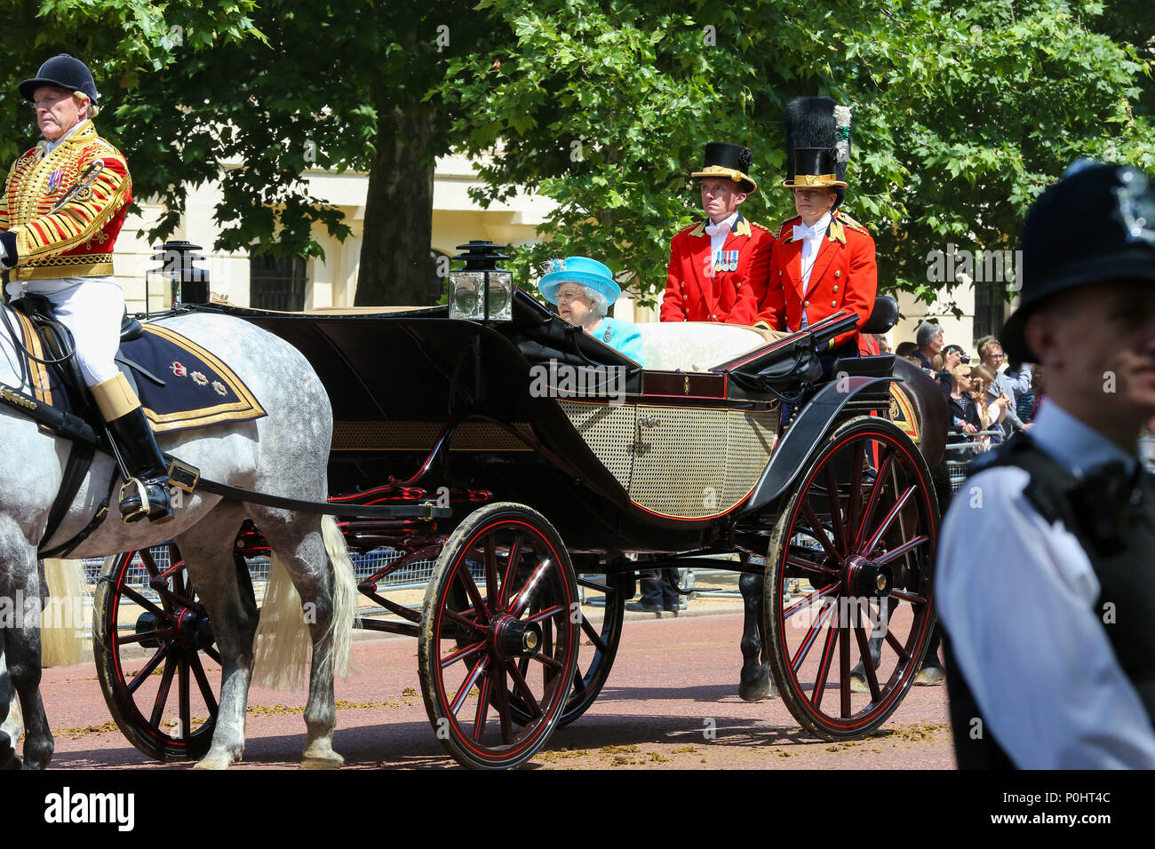 The Mall. London. UK 9 June 2018 - HM The Queen Elizabeth II joined by other members of the Royal Family travel along the Mall in an open top carriage during the Trooping the Colour which marks the 92nd celebration of The Queen's official birthday, during which she inspects troops from the Household Division as they march in Whitehall, before watching a fly-past from the balcony at Buckingham Palace. Credit: Dinendra Haria/Alamy Live News Stock Photo