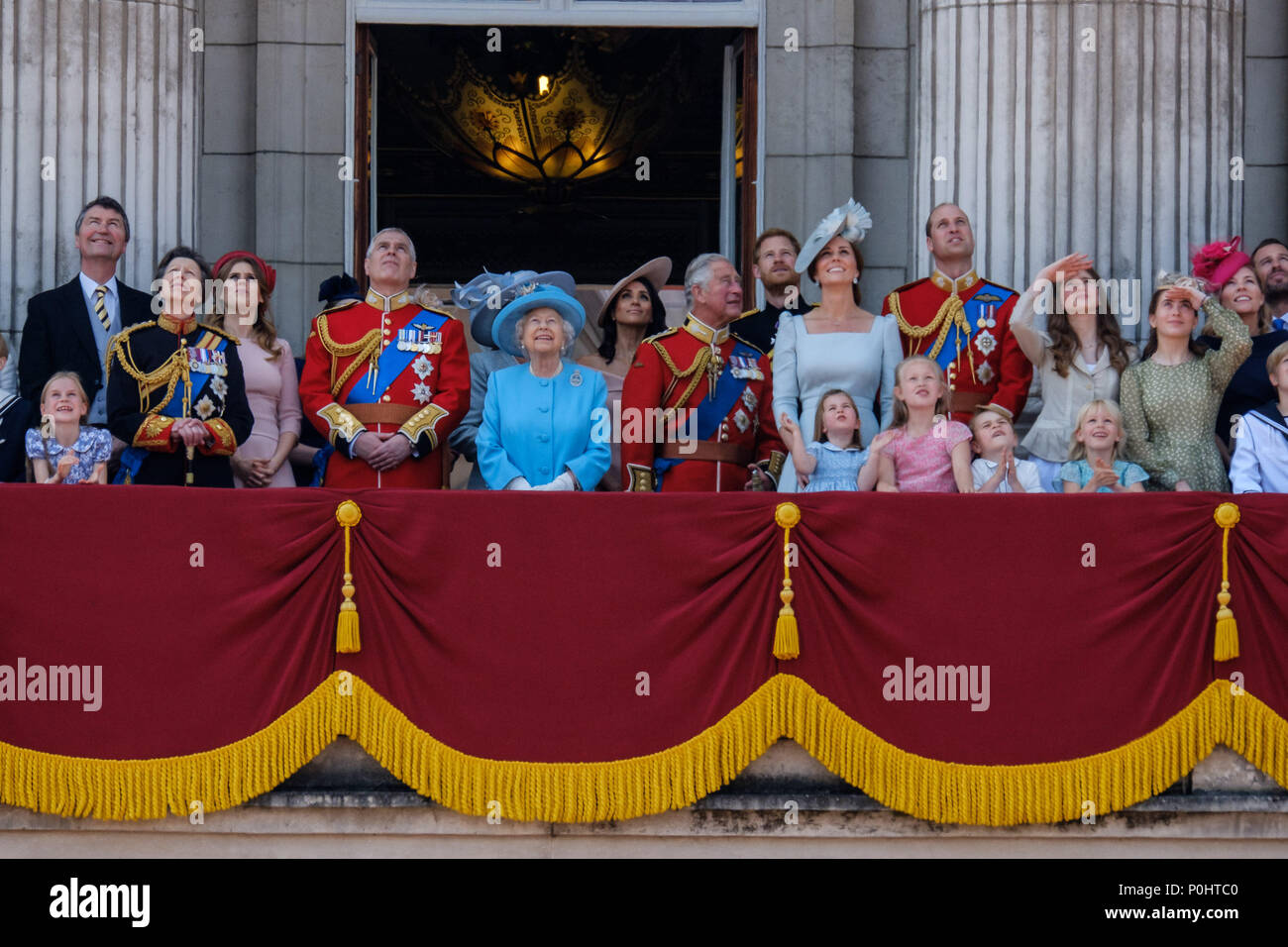London, UK, 9 June 2018. The Royal Family gather on the palace balcony  at Trooping the Colour and Queens Birthday Parade on Saturday 9 June 2018 in Buckingham Palace , London. Pictured: Anne, The Princess Royal, Prince Andrew, The Duke of York, HRH Queen Elizabeth II, Prince Charles, Prince of Wales, Meghan Markle, Duchess of Sussex, Prince Harry, The Duke of Sussex, Kate, Duchess of Cambridge, Prince William, Duke of Cambridge, Princess Charlotte of Cambridge , Prince George of Cambridge. Picture by Julie Edwards. Credit: Julie Edwards/Alamy Live News Stock Photo