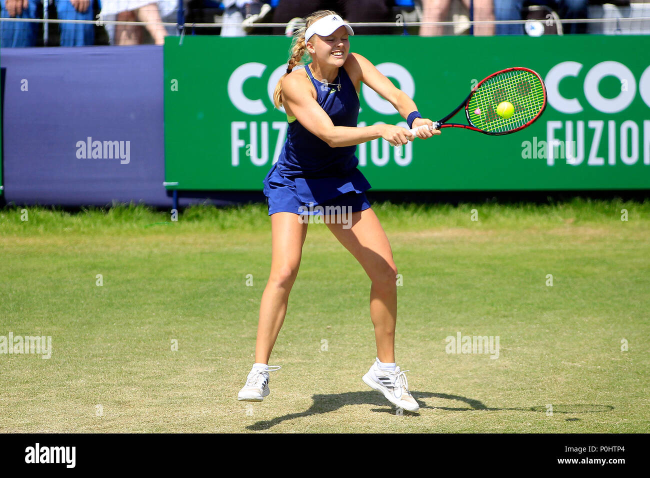 London, UK, Harriet Dart of Great Britain in action in her semi final  against Conny Perrin of Switzerland. Fuzion 100 Surbiton trophy 2018 tennis  event , day 6 at the Surbiton Racket