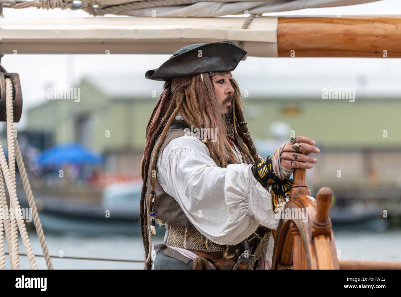 Poole, UK. 9th June, 2018. Capatin Jack Sparrow look-a-like on a boat the Poole Harbour Boat Show, a free maritime festival in Dorset. Credit: Thomas Faull/Alamy Live News Stock Photo