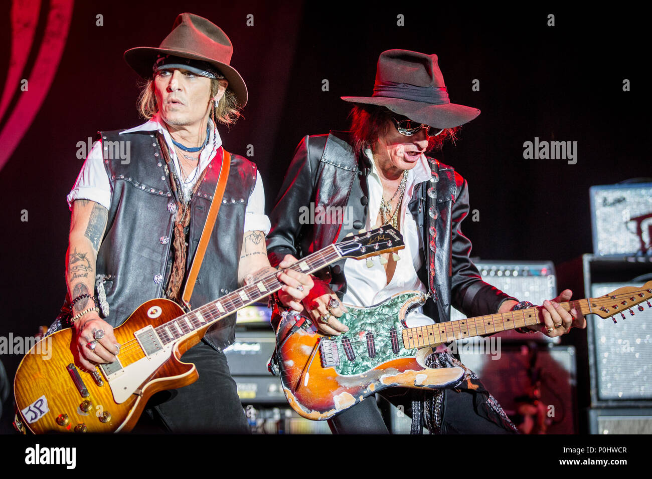 Denmark, Copenhagen - June 8, 2018. The American rock band Hollywood  Vampires performs a live concert during Fredagsrock in Tivoli Copenhagen.  Here guitarists Johnny Depp (L) and Joe Perry (R) are seen