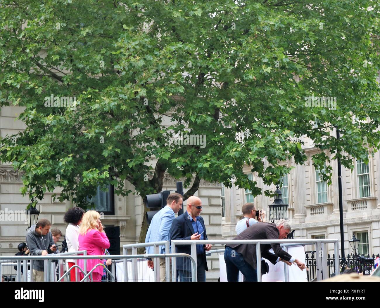 London, UK. 9th June 2018. Free Tommy Robinson March in London, UK with thousands of people marching and waving flags and plaques, police also in attendance at this event with riot wear. Credit: Michelle Bridges/Alamy Live News Stock Photo