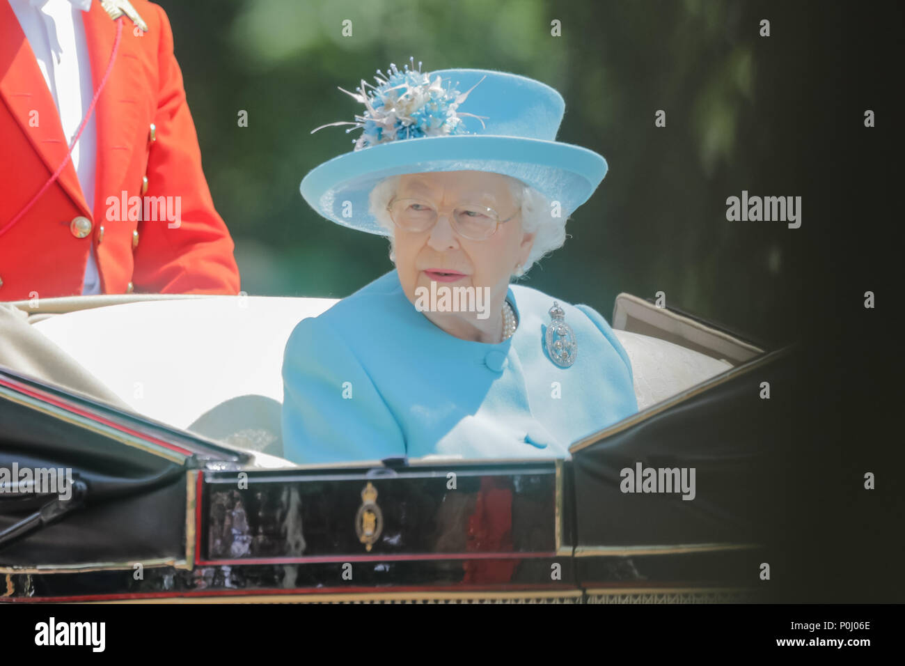 London, UK. 9th June 2018. HM Queen Elizabeth II rides alone in a horse drawn carriage in the procession along The Mall at Trooping the Colour, The Queens Birthday Parade. London. Credit: amanda rose/Alamy Live News Stock Photo