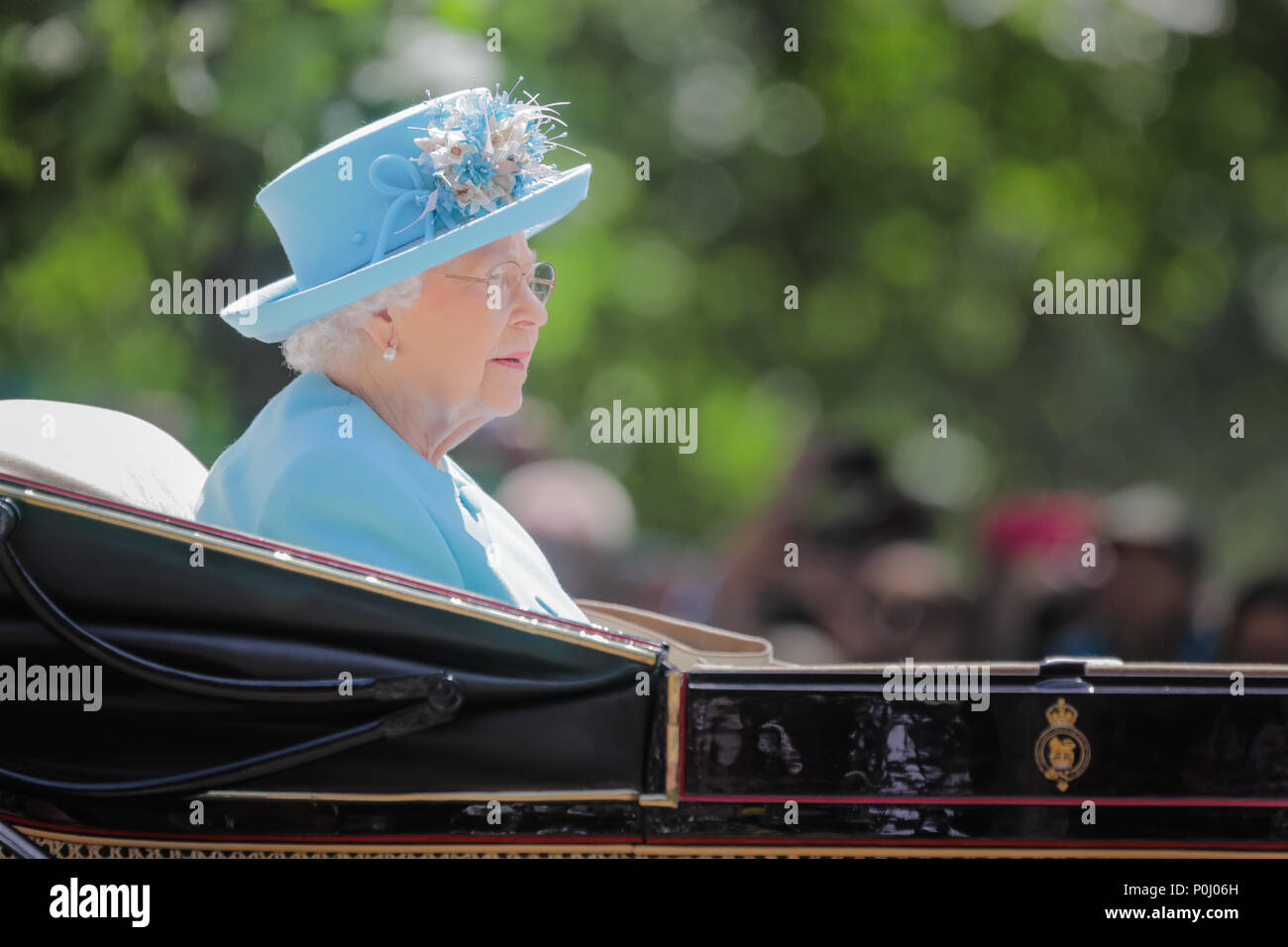 London, UK. 9th June 2018. HM Queen Elizabeth II rides alone in a horse drawn carriage in the procession along The Mall at Trooping the Colour, The Queens Birthday Parade. London. Credit: amanda rose/Alamy Live News Stock Photo