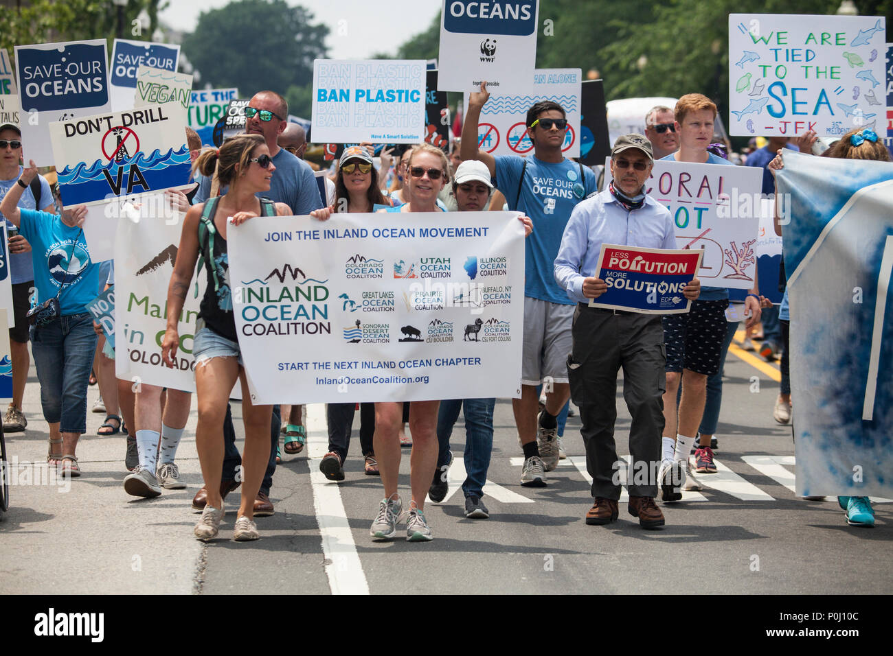 Washington DC, USA. 9th June 2018. Activists carry signs near the White House on the March For The Ocean in Washington, D.C., June 9, 2018. The inaugural March for the Ocean called attention to ocean issues including plastic pollution and overfishing at events in the U.S. Capital and around the United States. Credit: Robert Meyers/Alamy Live News Stock Photo
