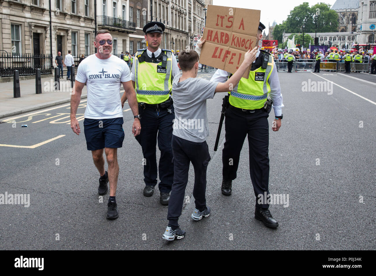 London, UK. 9th June, 2018. Supporters of Tommy Robinson, former leader of  the far-right English Defence League, challenge anti-fascists protesting  against the March for Tommy Robinson outside Downing Street. Tommy Robinson  was