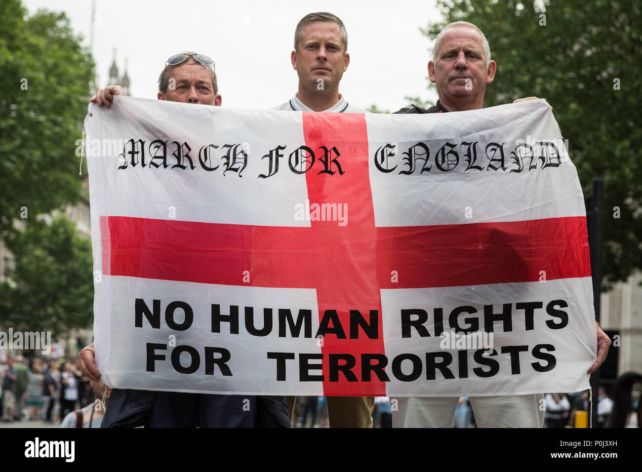 London, UK. 9th June 2018. ‘Free Tommy Robinson’ protest by hundreds of nationalist supporters of the former EDL leader who is currently serving 13 months in jail for contempt of court. Protesters march from Trafalgar Square to Whitehall with some violent clashes outside Downing Street after attempting to storm the gates. Tommy Robinson, 35, was arrested outside Leeds Crown Court last month while streaming a Facebook live video outside the trial. The broadcast lasted an hour and was watched more than 250,000 times. Credit: Guy Corbishley/Alamy Live News Stock Photo