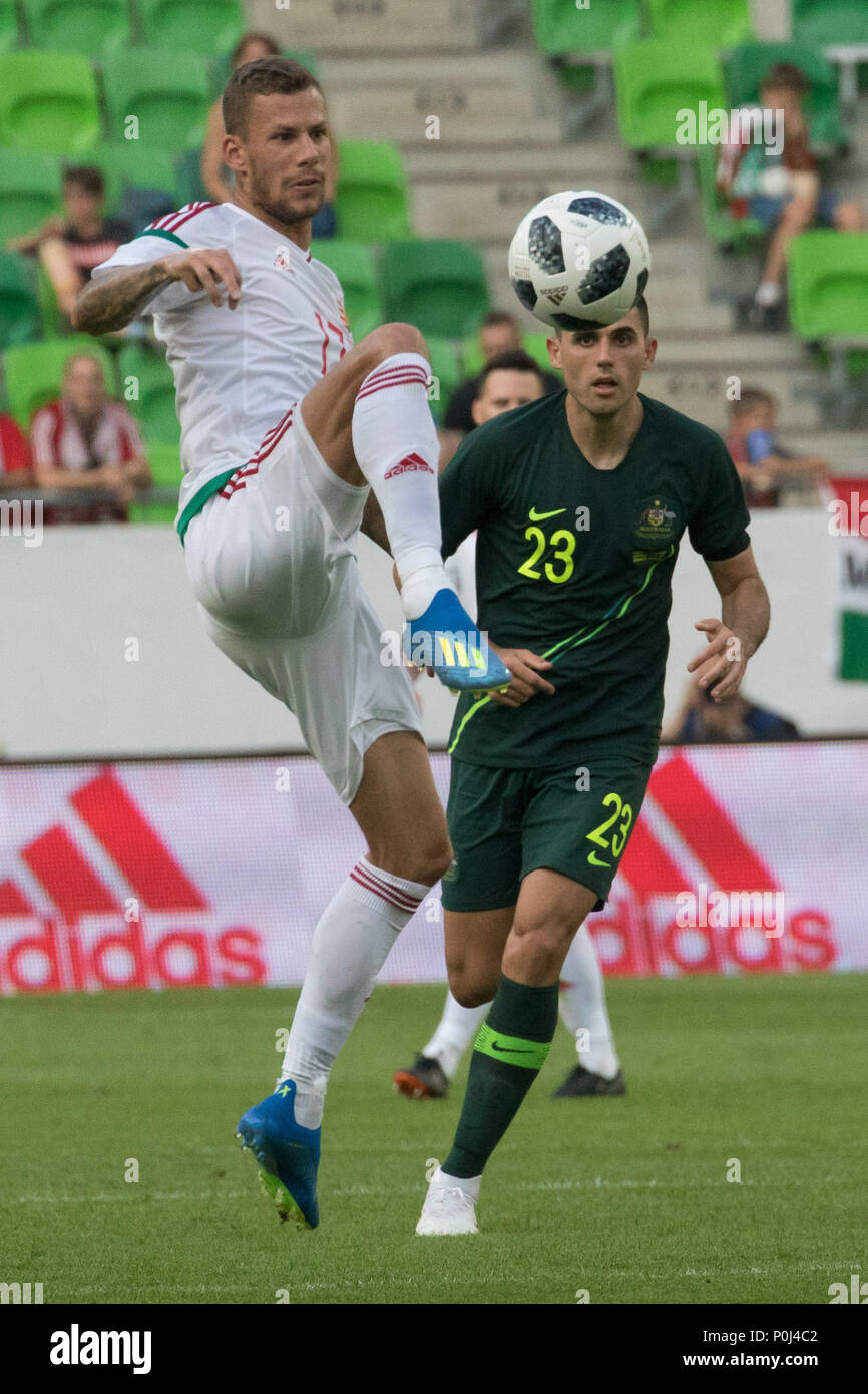 BUDAPEST, HUNGARY - JULY 12: (r-l) Roland Varga of Ferencvarosi TC hugs  goal scorer Stefan