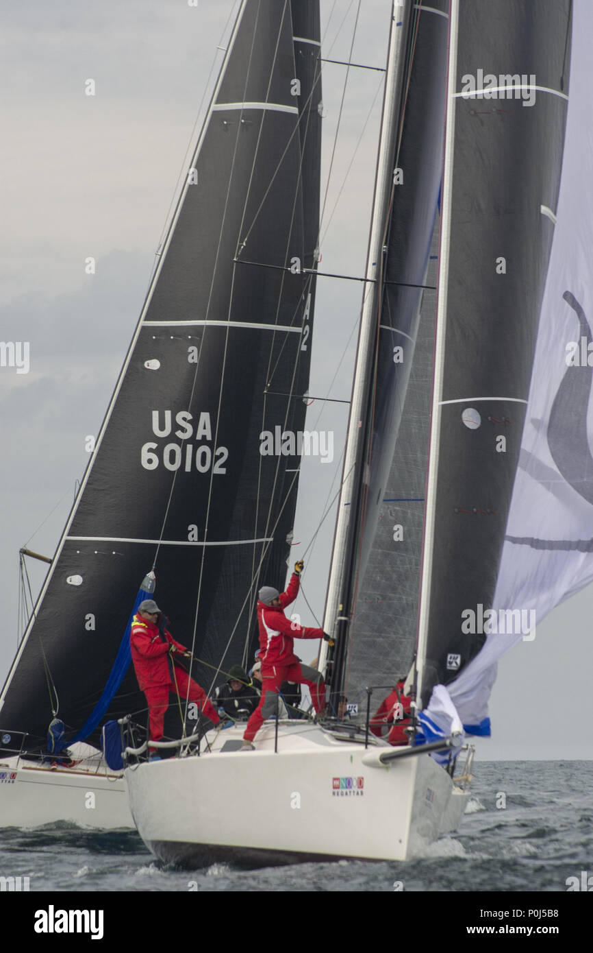 Chicago, IL, USA. 8th June, 2018. The National Offshore One Design 2018 regatta takes place in Chicago from June 8 to June 10. Yachtsmen on more than a 100 boats gather to test their sailling knowledge against each other. There are 3 circles of different fleets racing . On Saturday, some of the boats go on a long distance race while the others race around the marks set up by the race committee. Helly Hansen (clothingwear) is the principal sponsor. The races are organized by Sailing World Magazine with the Chicago Yacht Club acting as host for the event. (Credit Image: © Karen I. Hirsch Stock Photo