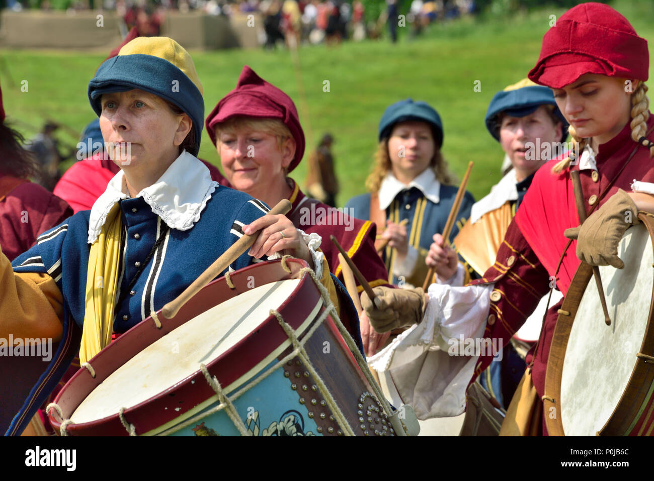 Marching drummers in 17th century costumes during English Civil war re-enactment, years 1641 to 1652, UK Stock Photo