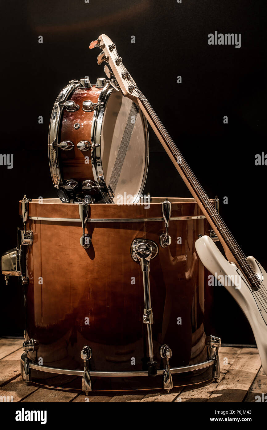 musical instruments, drum bass Bochka bass guitar on a black background Stock Photo