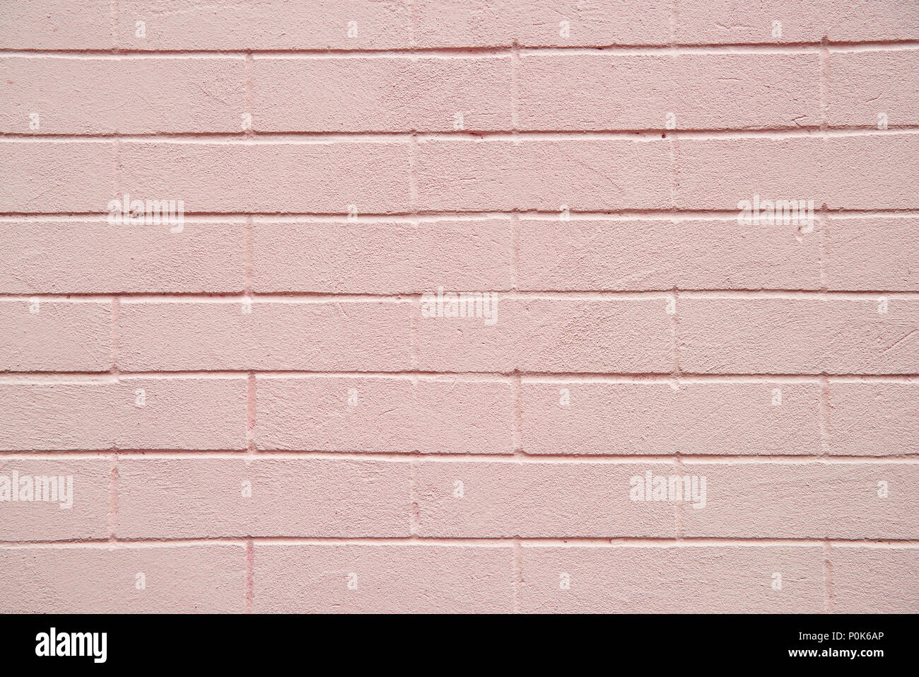 Pink bricks wall texture background Stock Photo - Alamy