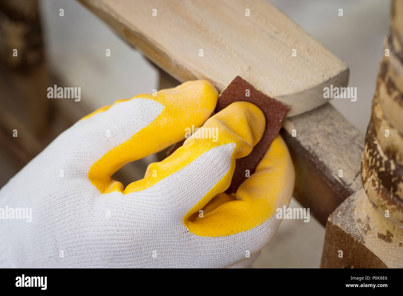 Sanding The Paint Of An Old Furniture Stock Photo