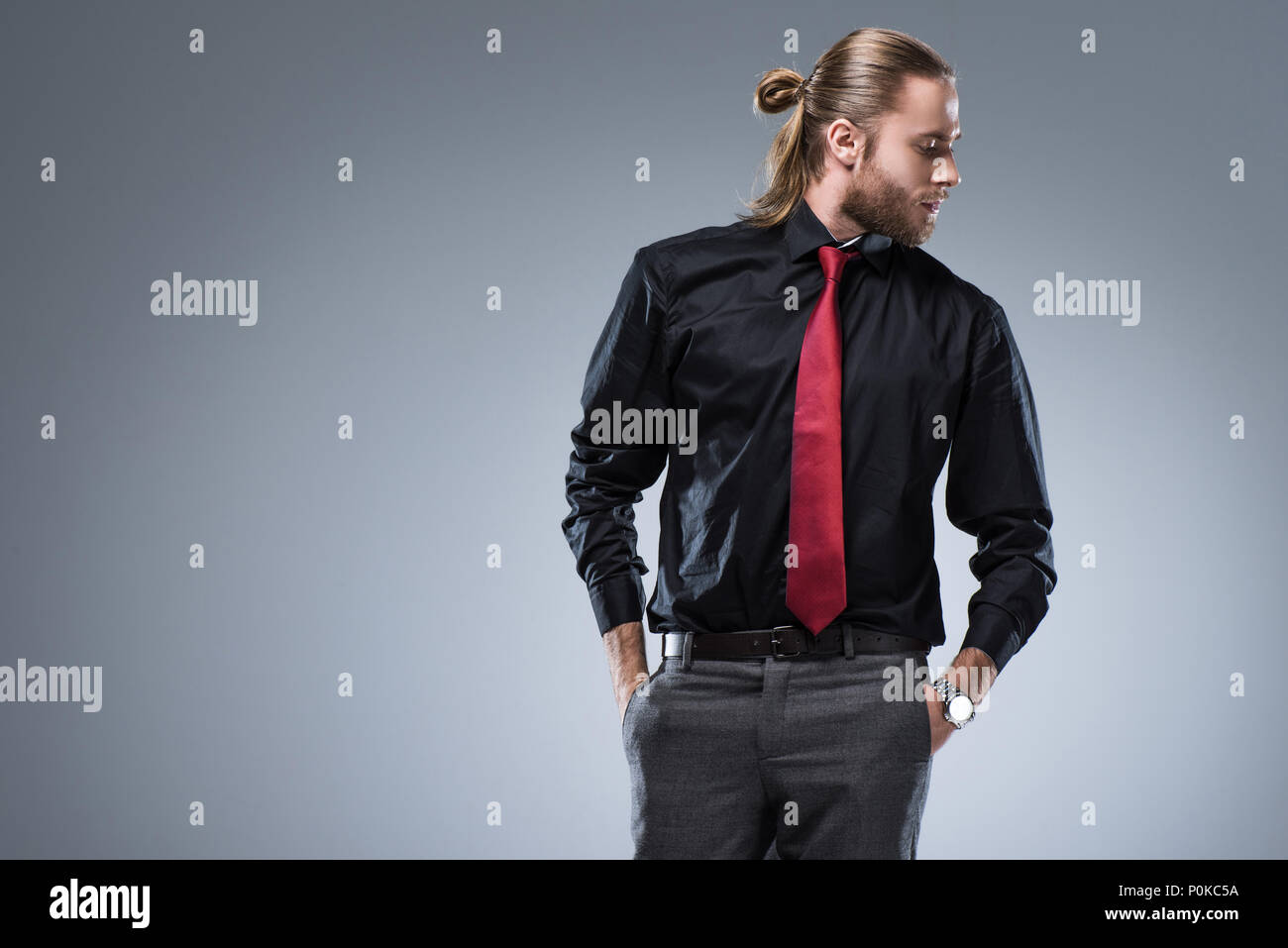 Black shirt red tie grey pants best sale