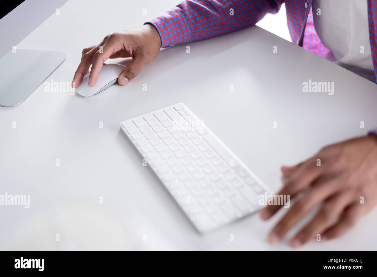 cropped image of african american man using computer Stock Photo