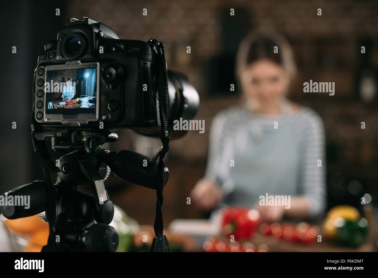 food blogger preparing food in kitchen Stock Photo