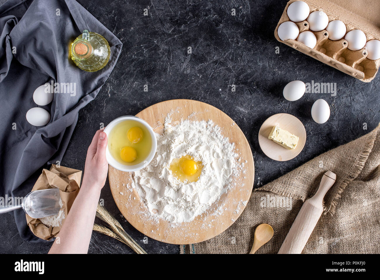 Cropped shot of woman mixing ingredients for bread stock photo alamy