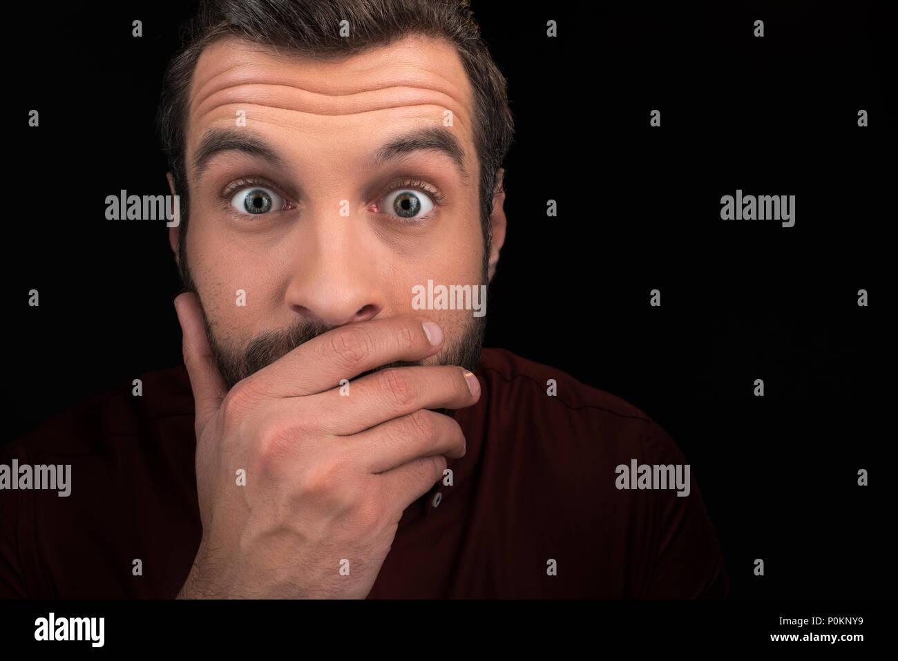 Portrait shocked young man covering hi-res stock photography and images ...