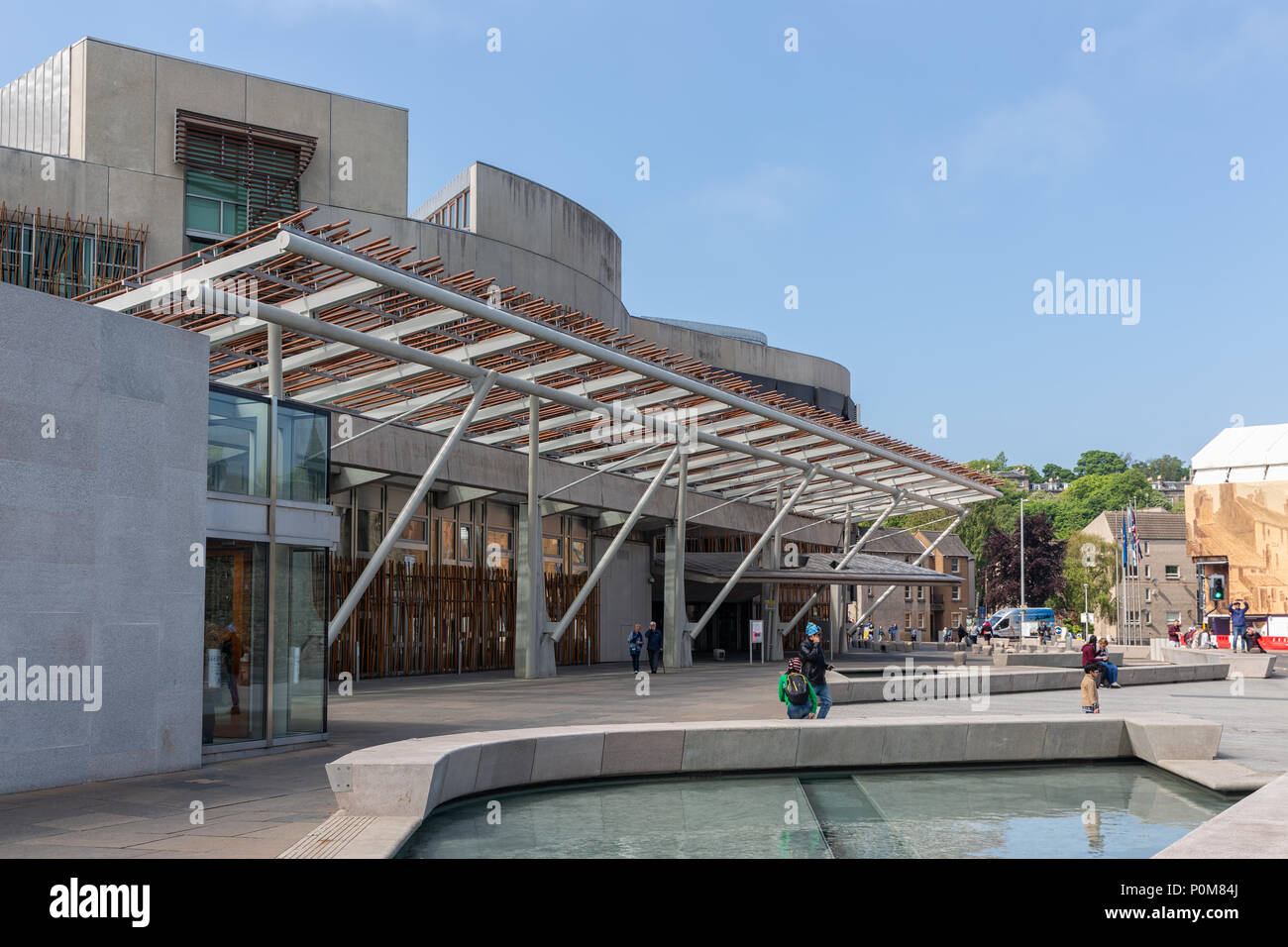 Square with pond in front of Scottish Parliament building Edinburgh. Stock Photo