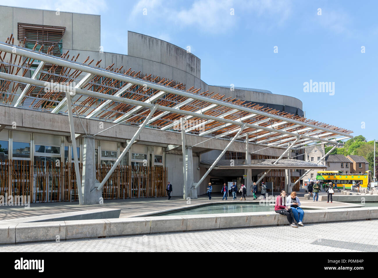 Square with pond in front of Scottish Parliament building Edinburgh. Stock Photo
