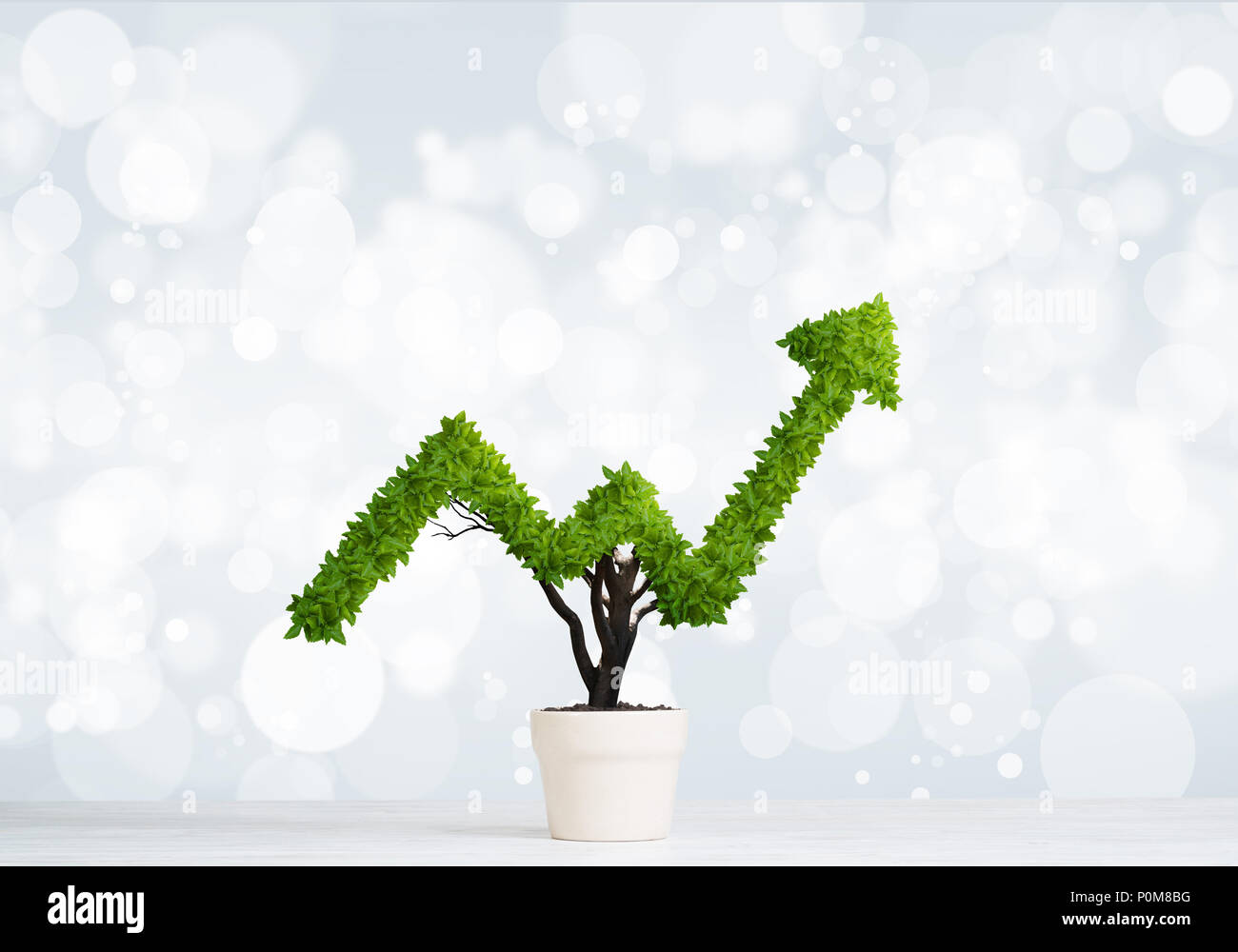 Concept of investment income and growth with tree in pot Stock Photo ...