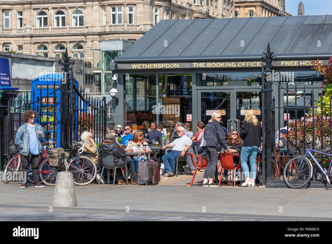 Restaurant near Edinburgh Waverley station with people at the terrace Stock Photo