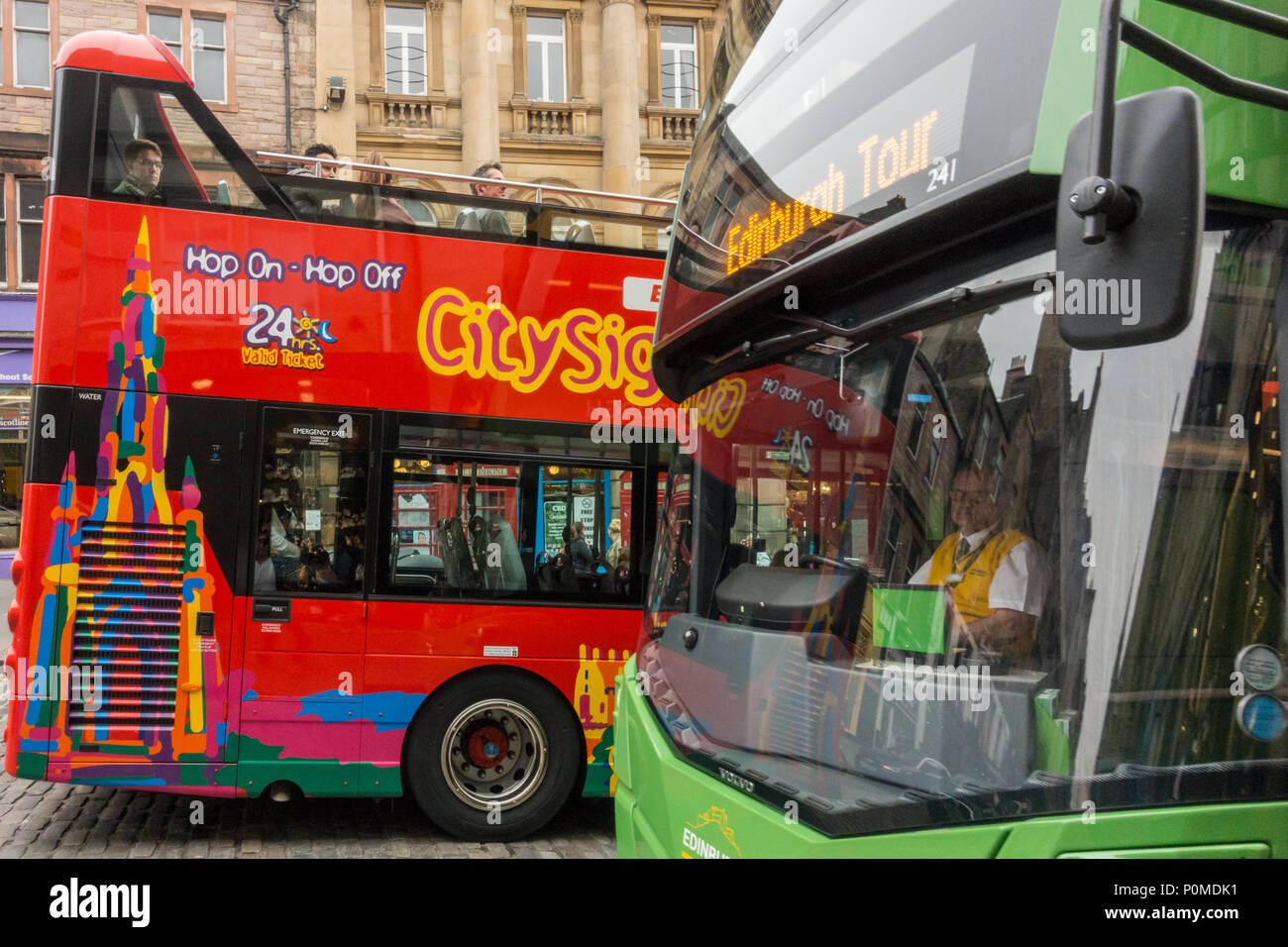 Tourist buses in Edinburgh Old Town, Scotland, UK Stock Photo