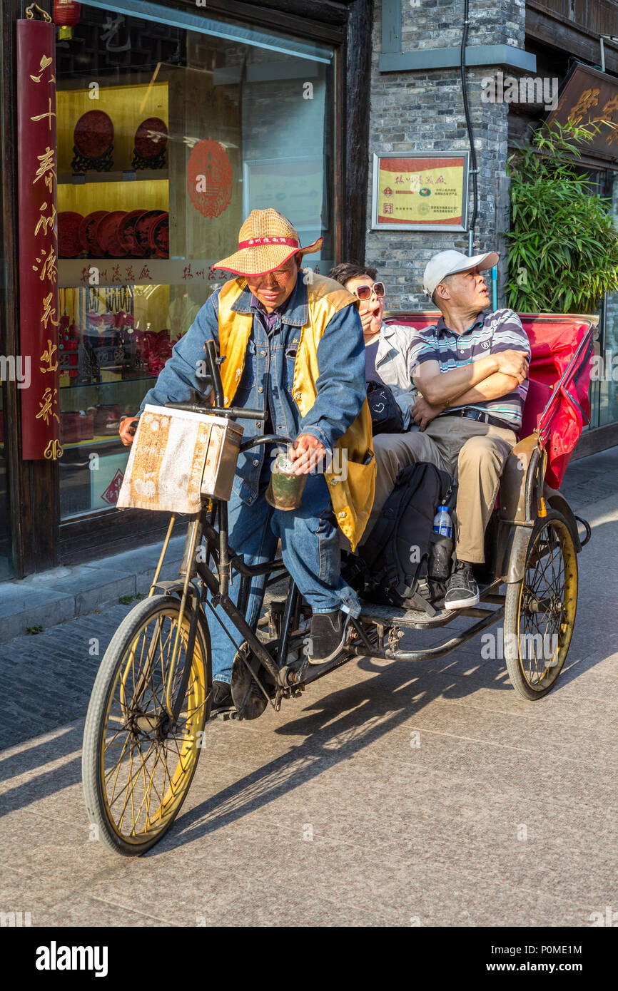 Chinese tricycle rickshaw hi-res stock photography and images - Alamy