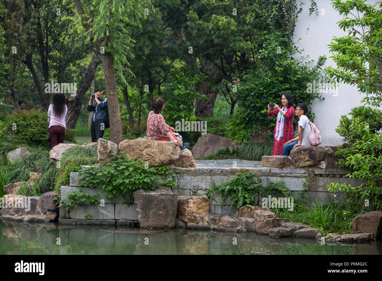 Yangzhou, Jiangsu, China.  Chinese Taking Pictures, Slender West Lake Park. Stock Photo
