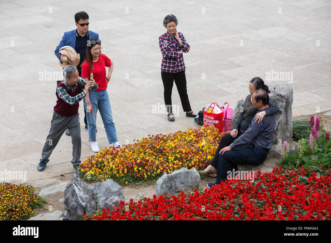 Yangzhou, Jiangsu, China.  Chinese Taking Photos in the Slender West Lake Park. Stock Photo
