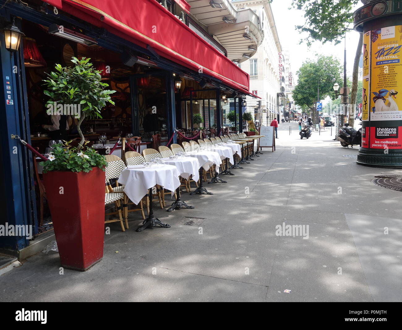 Cafe ready for service, before the lunchtime hour, terrace of Le Grand ...