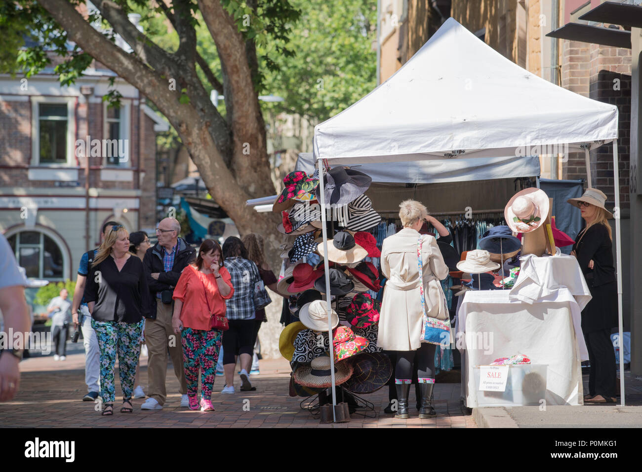Market stalls selling fashion and art, part of a large weekend market in Sydney's historic Rocks Precinct in New South Wales, Australia Stock Photo
