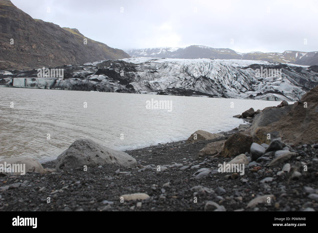 Solheimajokull is a glacier in southern Iceland, between the volcanoes Katla and Eijafjallajokkull. Part of the larger Myrdalsjokull glacier, Solheimajokull is a prominent and popular tourist location Stock Photo