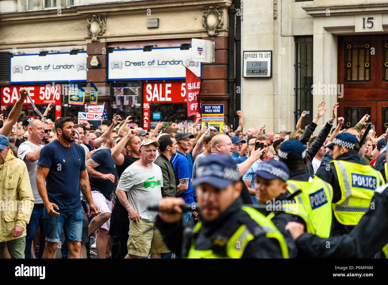 Supporters of Tommy Robinson such as the EDL protested in London demonstrating for his release. At times this turned to violence against police Stock Photo